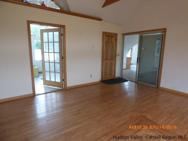 2199 Burroughs Memorial Road Roxbury, NY 12474 - Photo 18 of 34 a view of an empty room with window and wooden floor