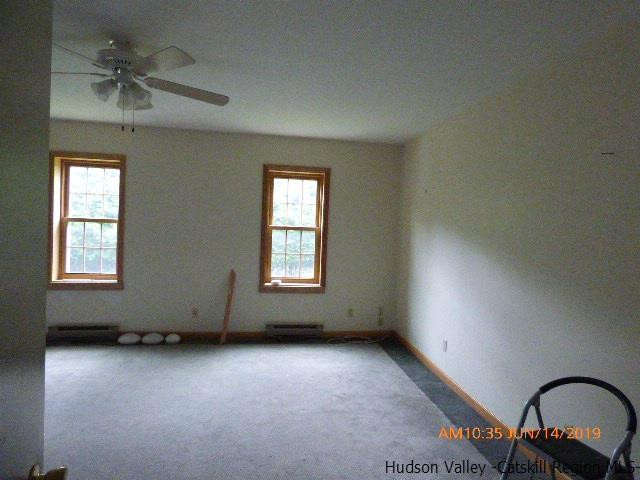 2199 Burroughs Memorial Road Roxbury, NY 12474 - Photo 30 of 34 an empty room with a window