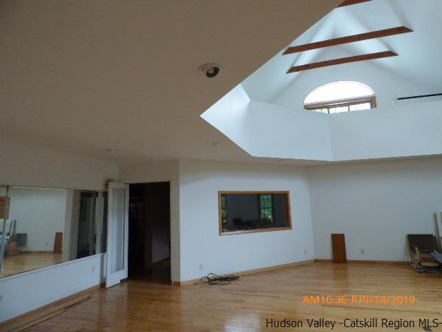 2199 Burroughs Memorial Road Roxbury, NY 12474 - Photo 10 of 34 a living room with furniture and a flat screen tv