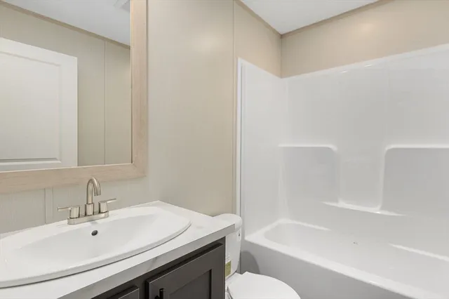 a bathroom with a sink and a bathtub