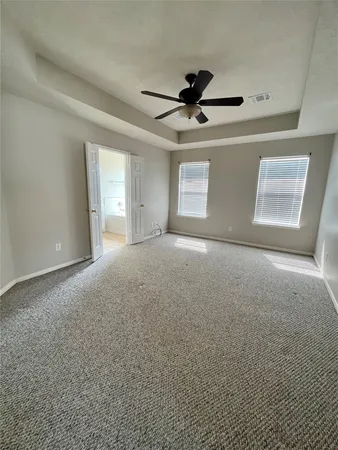 a view of a big room with carpet