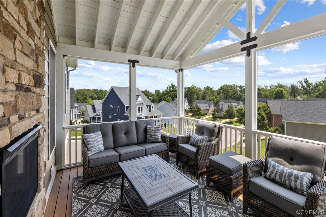 3825 Bircham Loop Midlothian, VA 23113 - Photo 33 of 38 Screened in porch w/ vaulted ceiling & stone firep