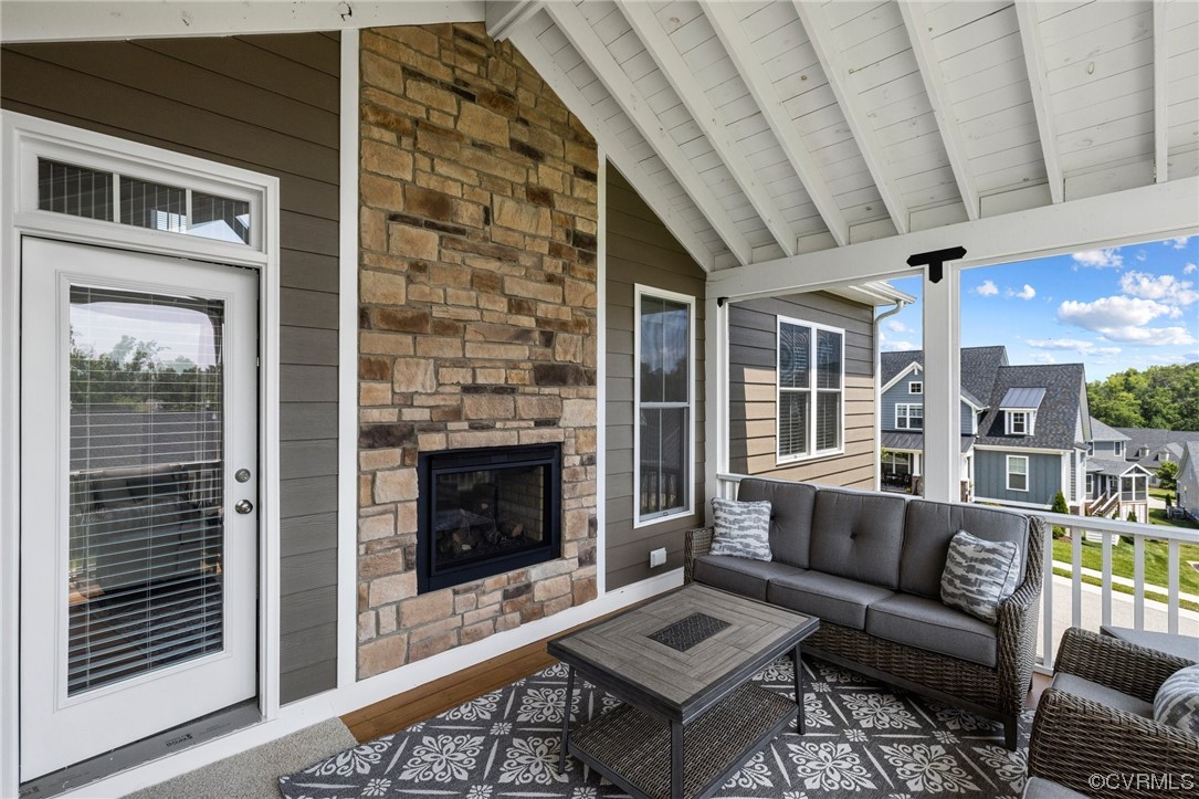 3825 Bircham Loop Midlothian, VA 23113 - Photo 34 of 38 Screened in porch w/ vaulted ceiling & stone firep