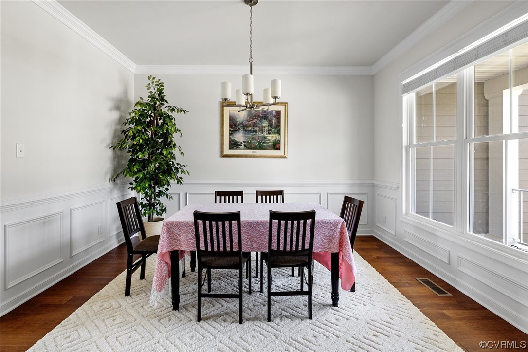 3825 Bircham Loop Midlothian, VA 23113 - Photo 7 of 38 Formal dining room with crown moulding and wainsco