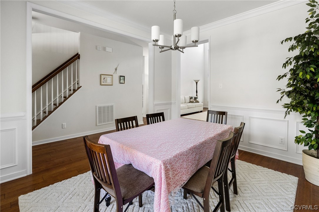 3825 Bircham Loop Midlothian, VA 23113 - Photo 8 of 38 Formal dining room with crown moulding and wainsco