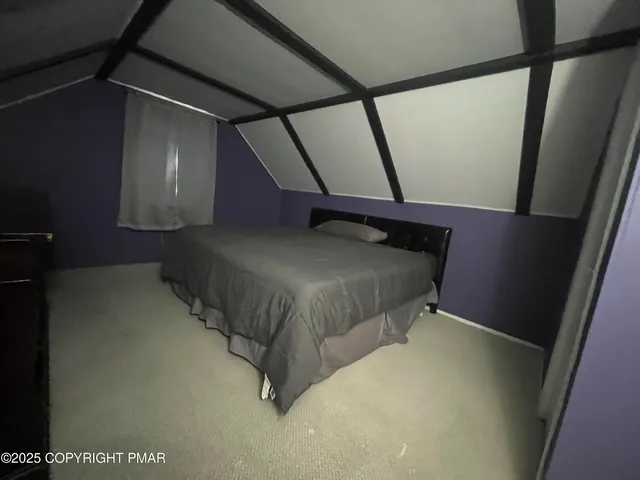 a bathroom with a sink a toilet a shower and a mirror