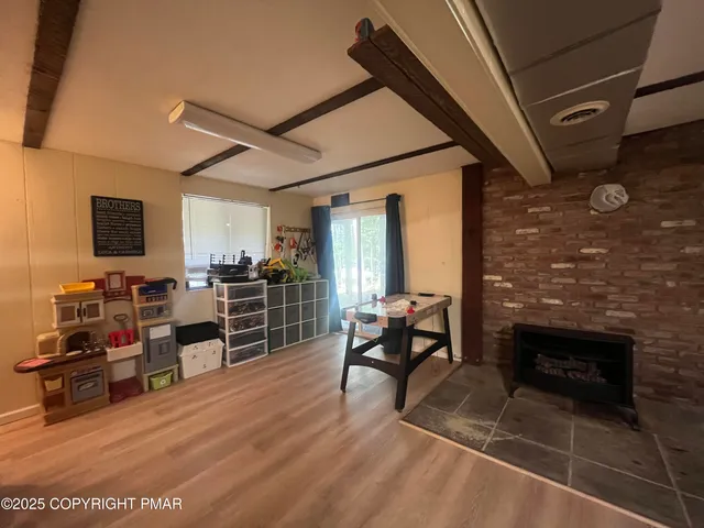 a living room with a fireplace