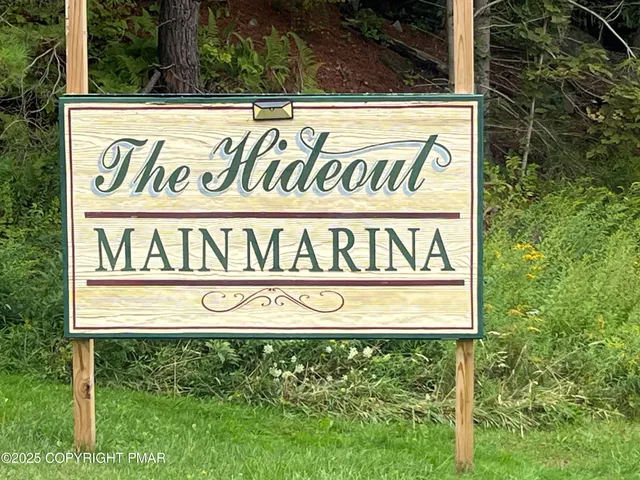 a view of a lake with sitting area