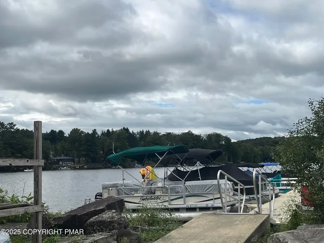 a view of a lake with a yard