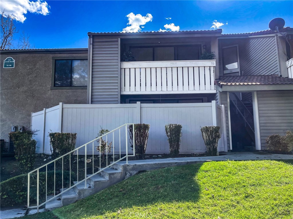 a view of a porch with furniture