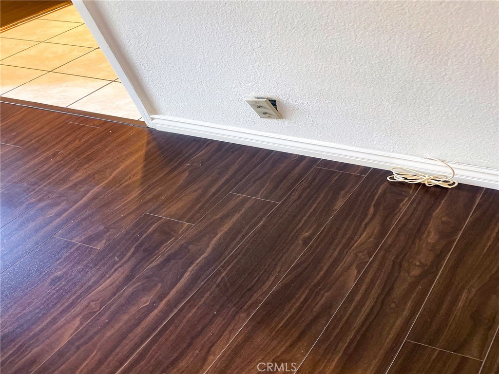 95 Country Mile Road, Unit 245 Pomona, CA 91766 - Photo 12 of 19 a view of a room with wooden floor