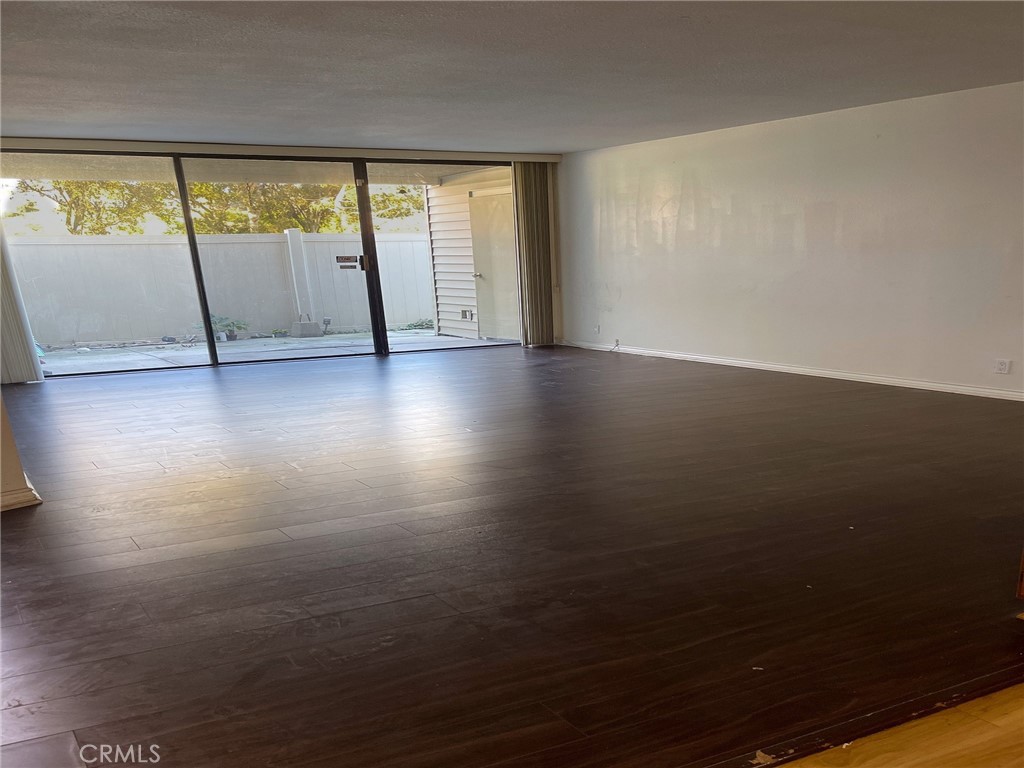 95 Country Mile Road, Unit 245 Pomona, CA 91766 - Photo 14 of 19 a view of an empty room with a window