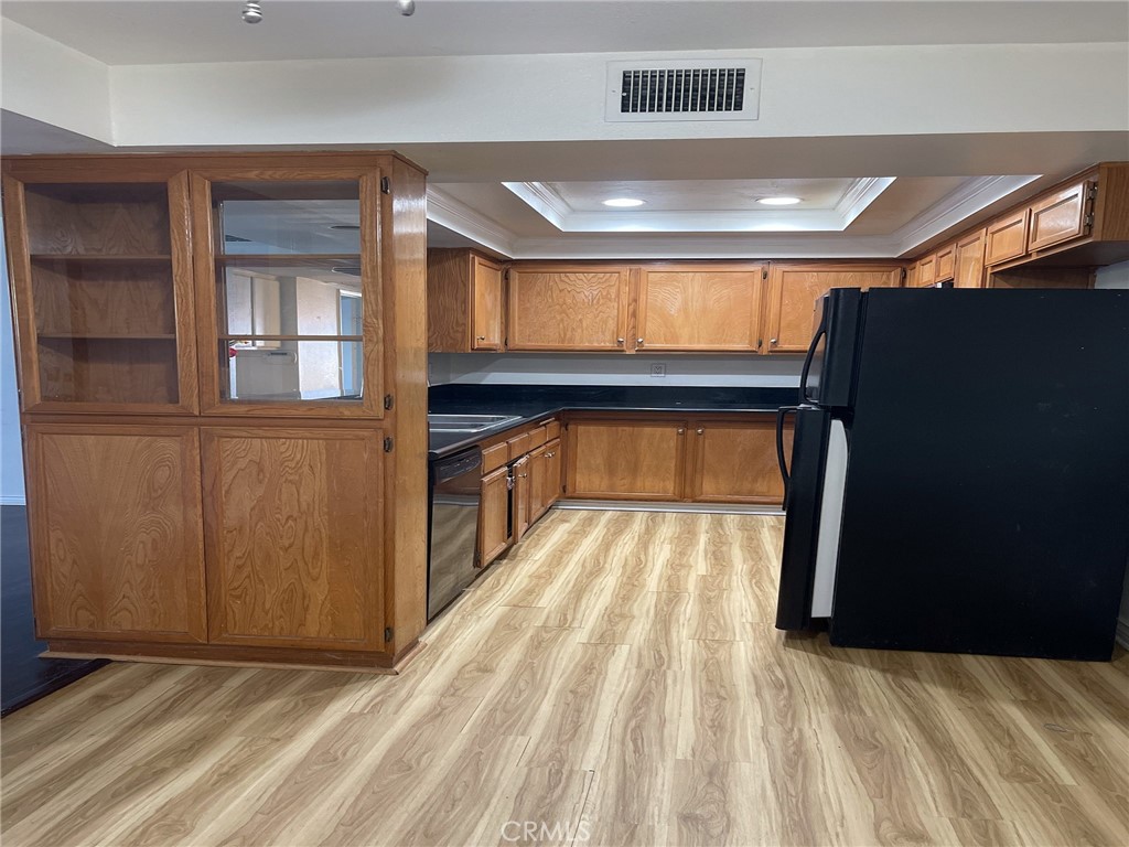 95 Country Mile Road, Unit 245 Pomona, CA 91766 - Photo 5 of 19 a view of a room with wooden floor