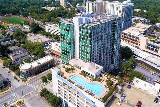 250 Pharr Road Northeast, Unit 507 Atlanta, GA 30305 - Photo 1 of 25 a view of city from balcony with outdoor space