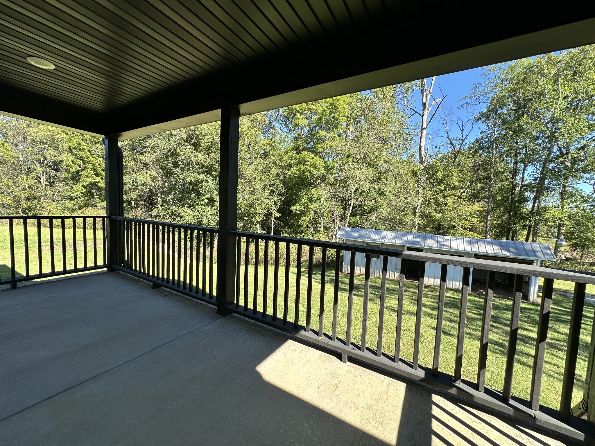 360 Coker Ford Road Portland, TN 37148 - Photo 15 of 46 a view of a two chairs in the balcony