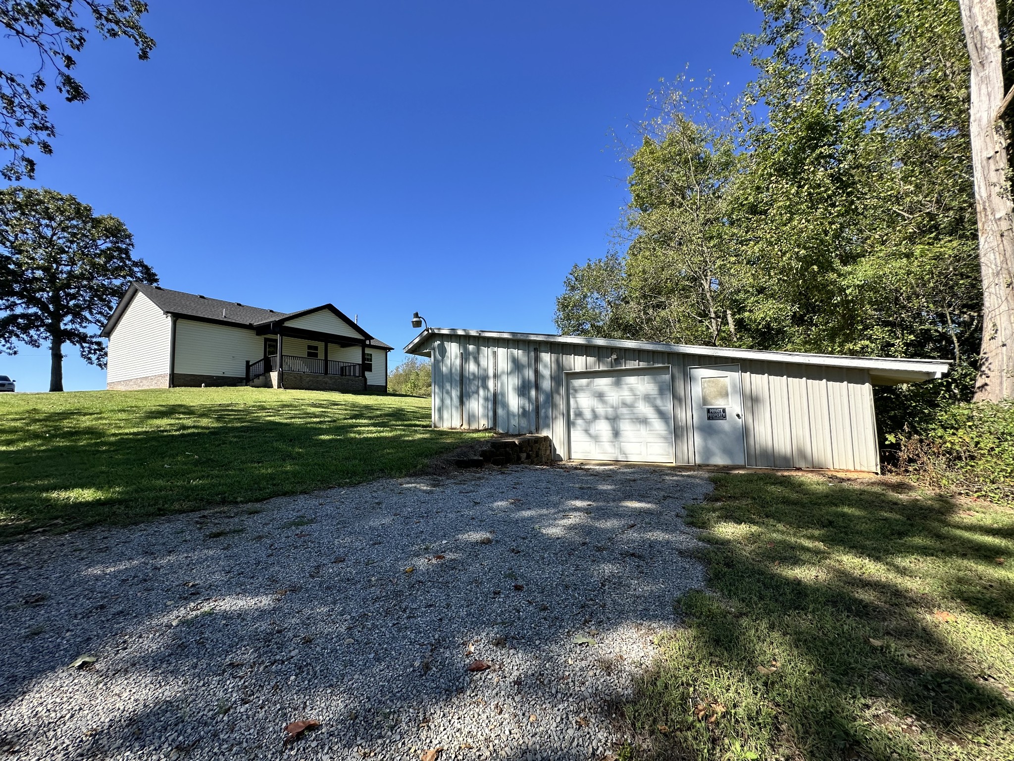 360 Coker Ford Road Portland, TN 37148 - Photo 20 of 46 a view of a house with a yard