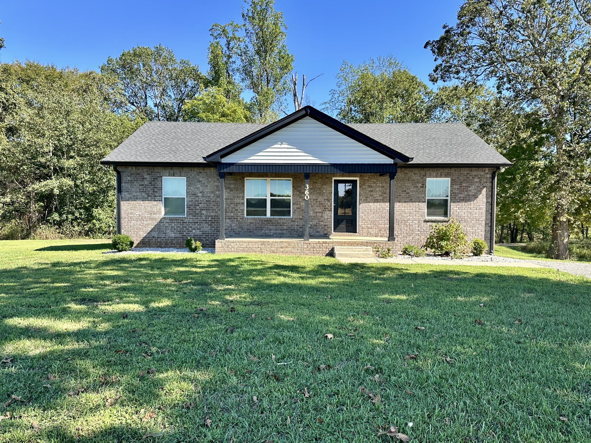 360 Coker Ford Road Portland, TN 37148 - Photo 2 of 46 a front view of a house with a yard