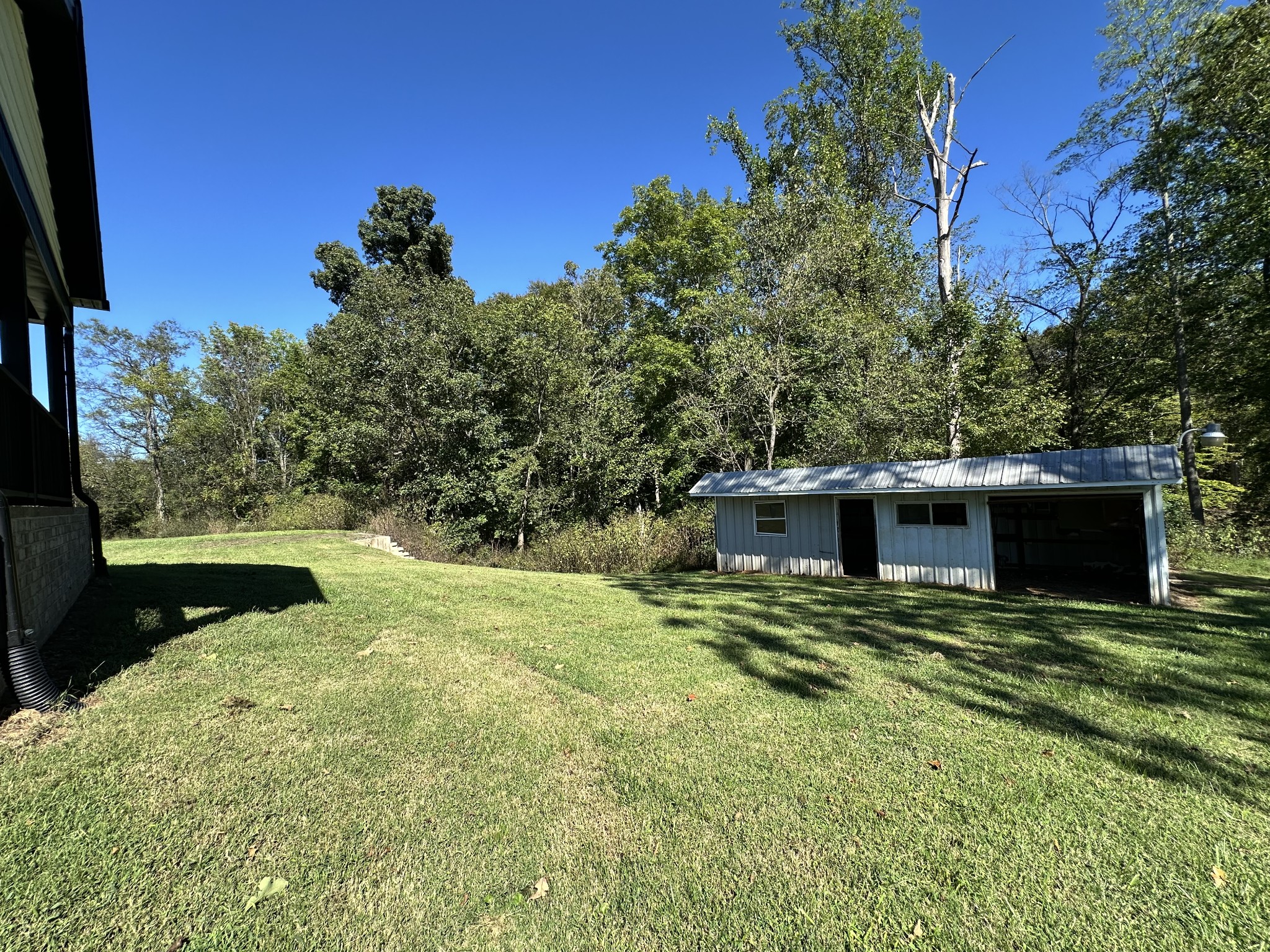 360 Coker Ford Road Portland, TN 37148 - Photo 22 of 46 a view of a backyard of the house
