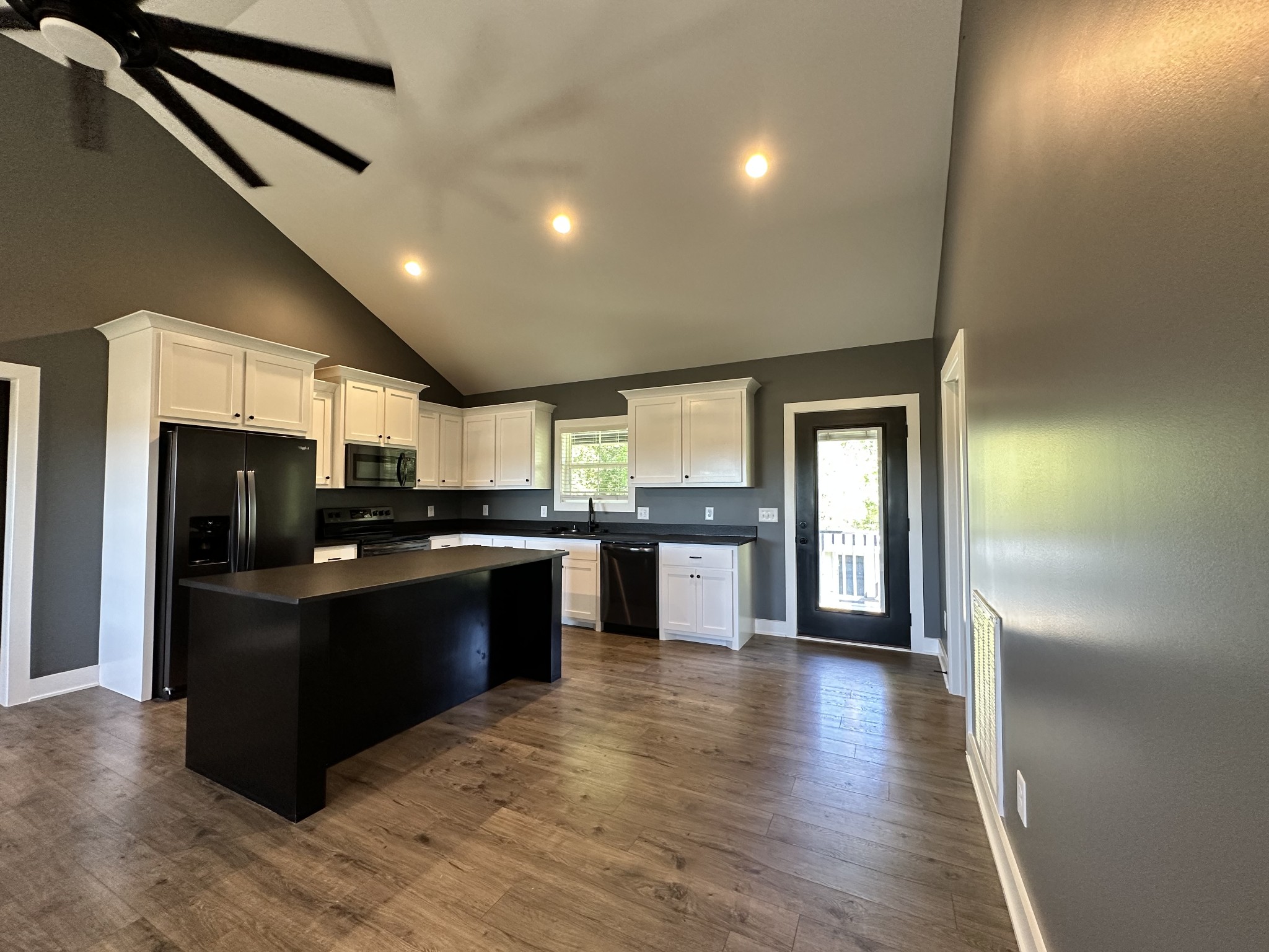 360 Coker Ford Road Portland, TN 37148 - Photo 35 of 46 a kitchen with stainless steel appliances granite countertop a refrigerator and a sink