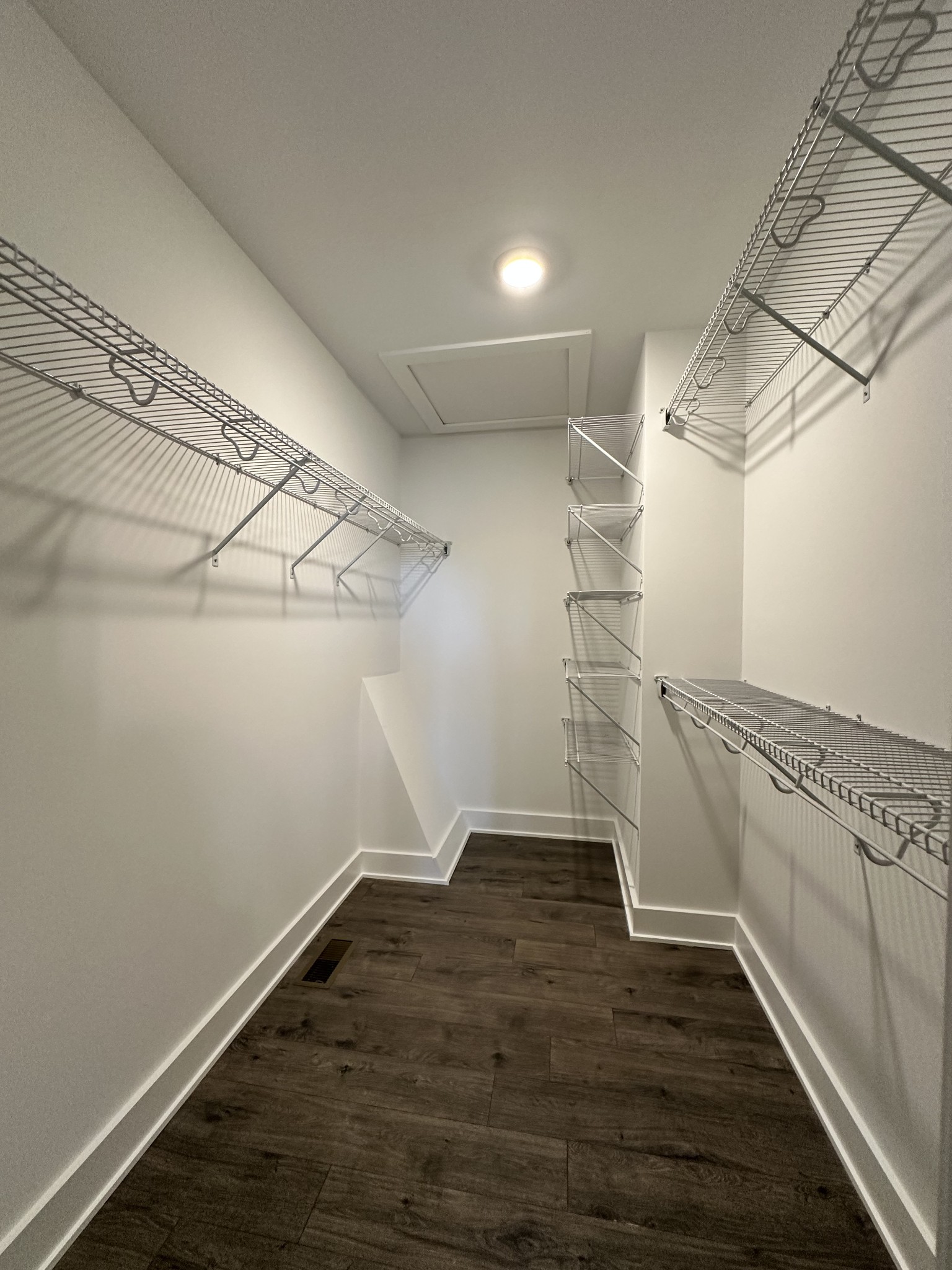 360 Coker Ford Road Portland, TN 37148 - Photo 43 of 46 a view of a room with racks on the wall