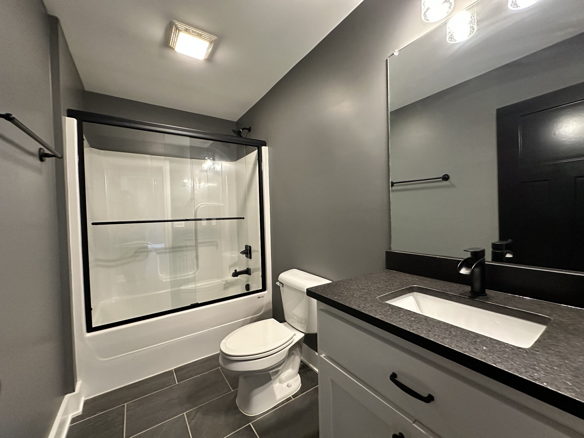 360 Coker Ford Road Portland, TN 37148 - Photo 44 of 46 a bathroom with a sink a toilet and shower