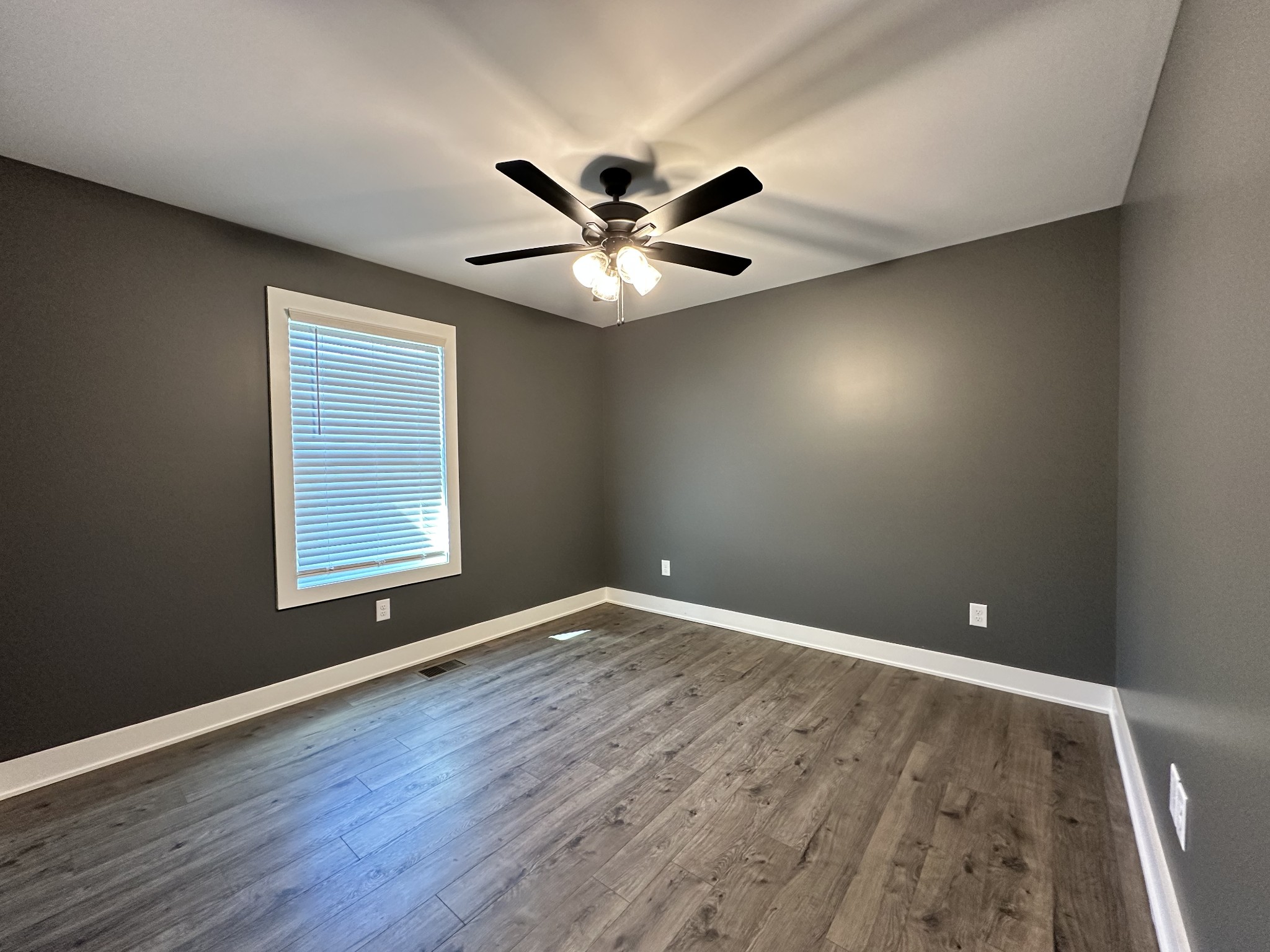 360 Coker Ford Road Portland, TN 37148 - Photo 46 of 46 wooden floor in an empty room with a window
