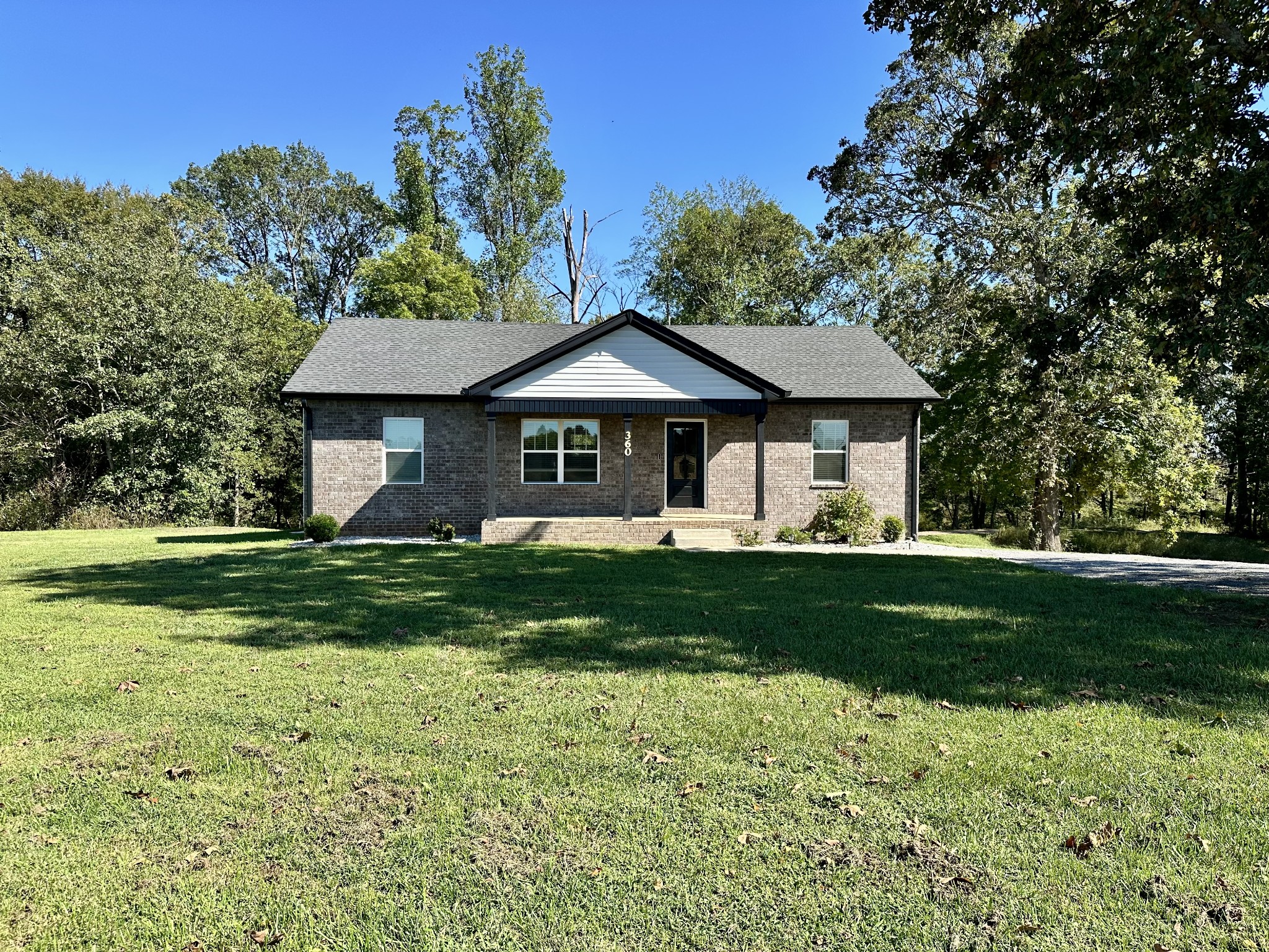 360 Coker Ford Road Portland, TN 37148 - Photo 6 of 46 a front view of a house with a yard