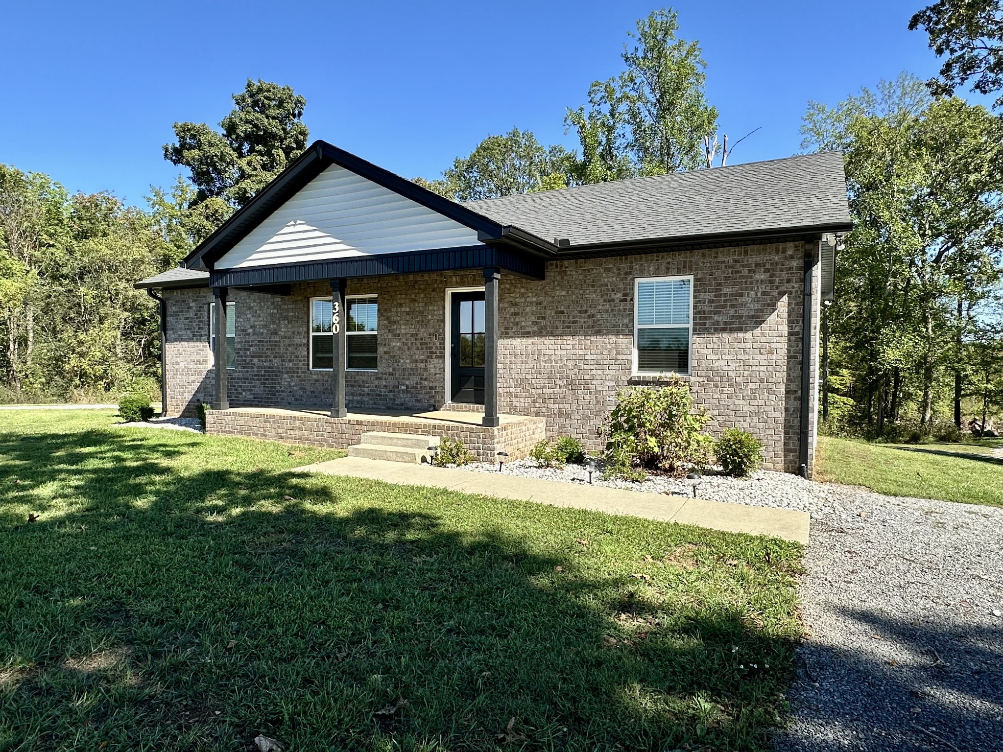 360 Coker Ford Road Portland, TN 37148 - Photo 7 of 46 a front view of a house with a yard