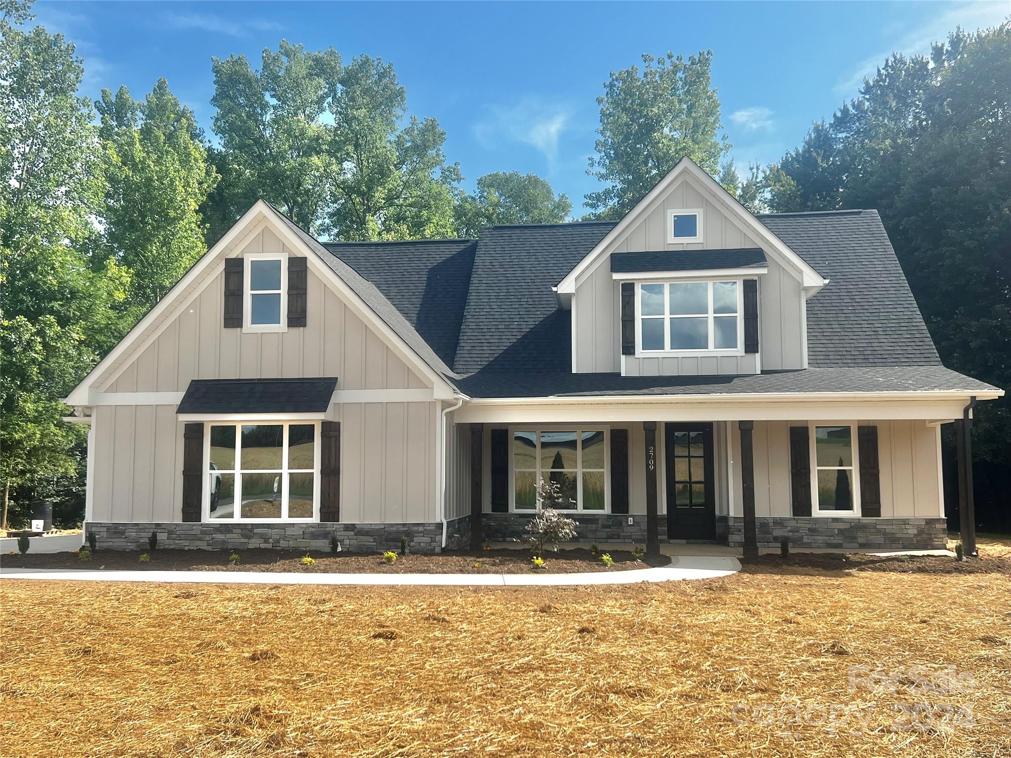 2709 Lathan Road Monroe, NC 28112 - Photo 2 of 26 front view of a house with a yard