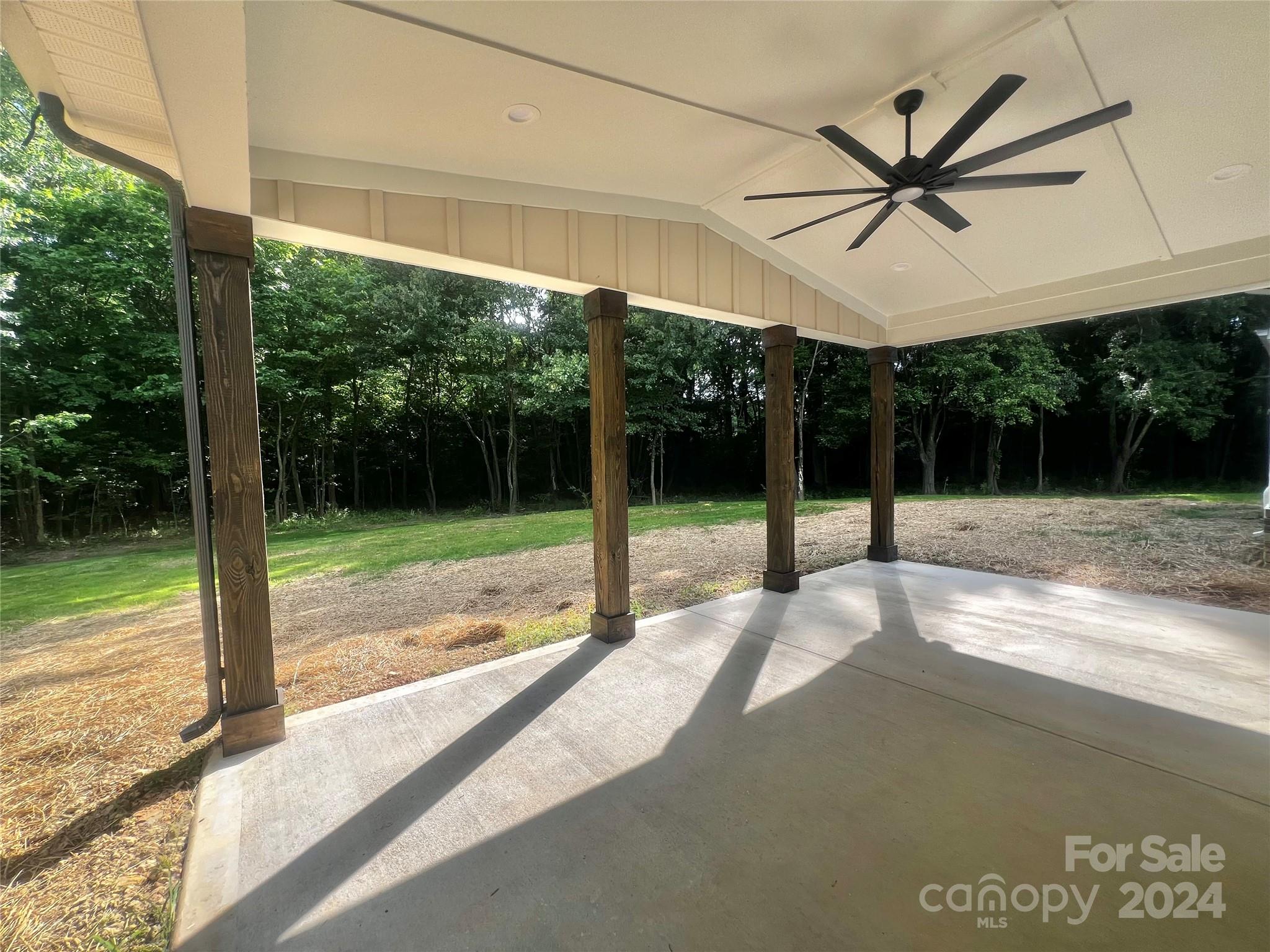 2709 Lathan Road Monroe, NC 28112 - Photo 22 of 26 a view of a porch with garden