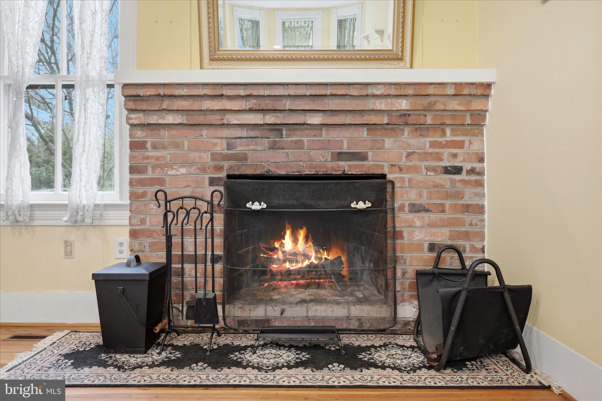 171 Laurel Grove Road Winchester, VA 22602 - Photo 11 of 83 a living room with furniture a fireplace and a rug