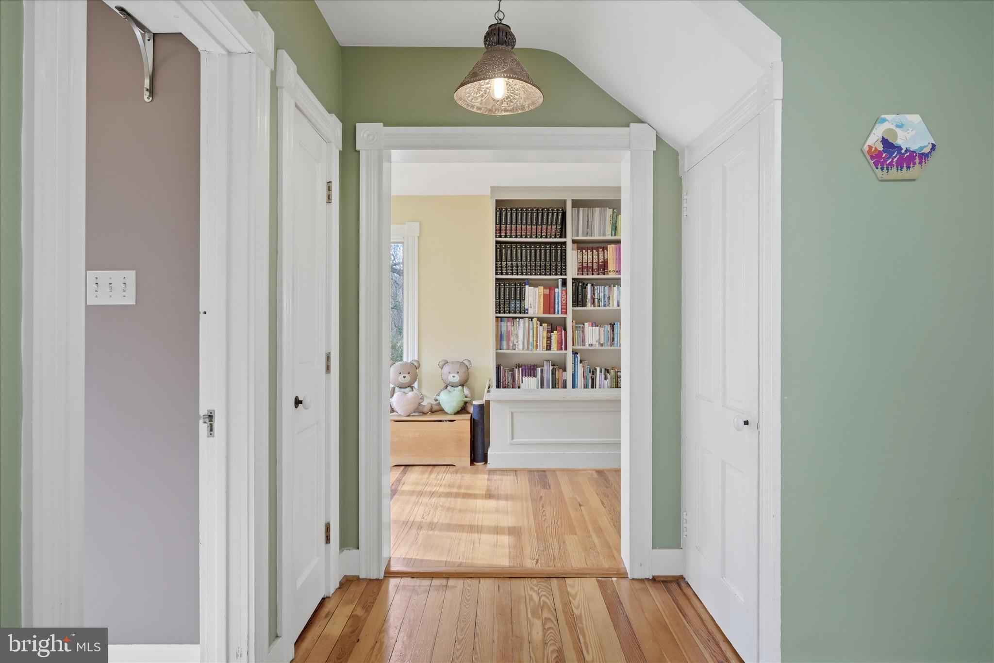 171 Laurel Grove Road Winchester, VA 22602 - Photo 21 of 83 a view of a hallway with wooden floor and dining room