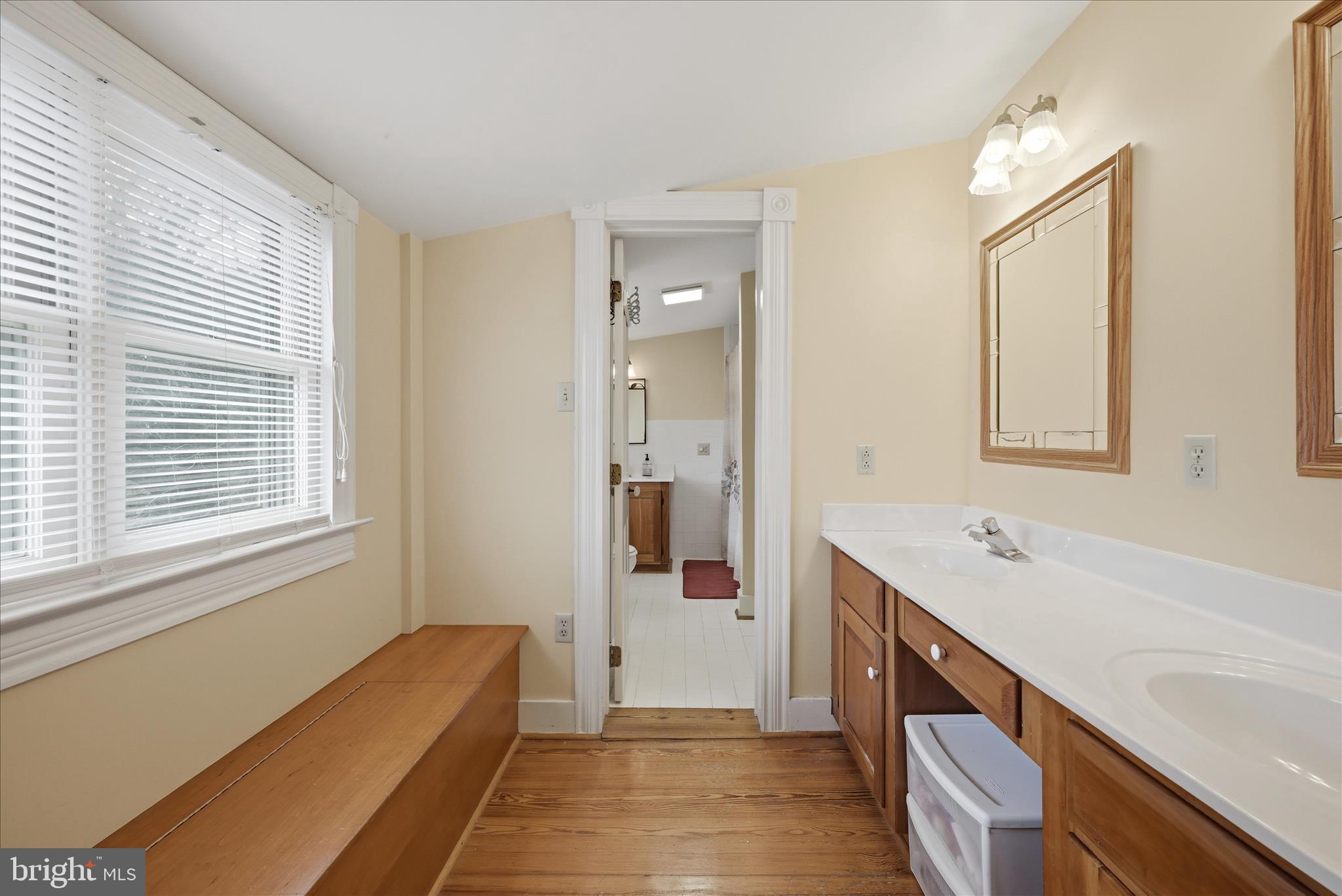 171 Laurel Grove Road Winchester, VA 22602 - Photo 37 of 83 a bathroom with a tub sink and mirror