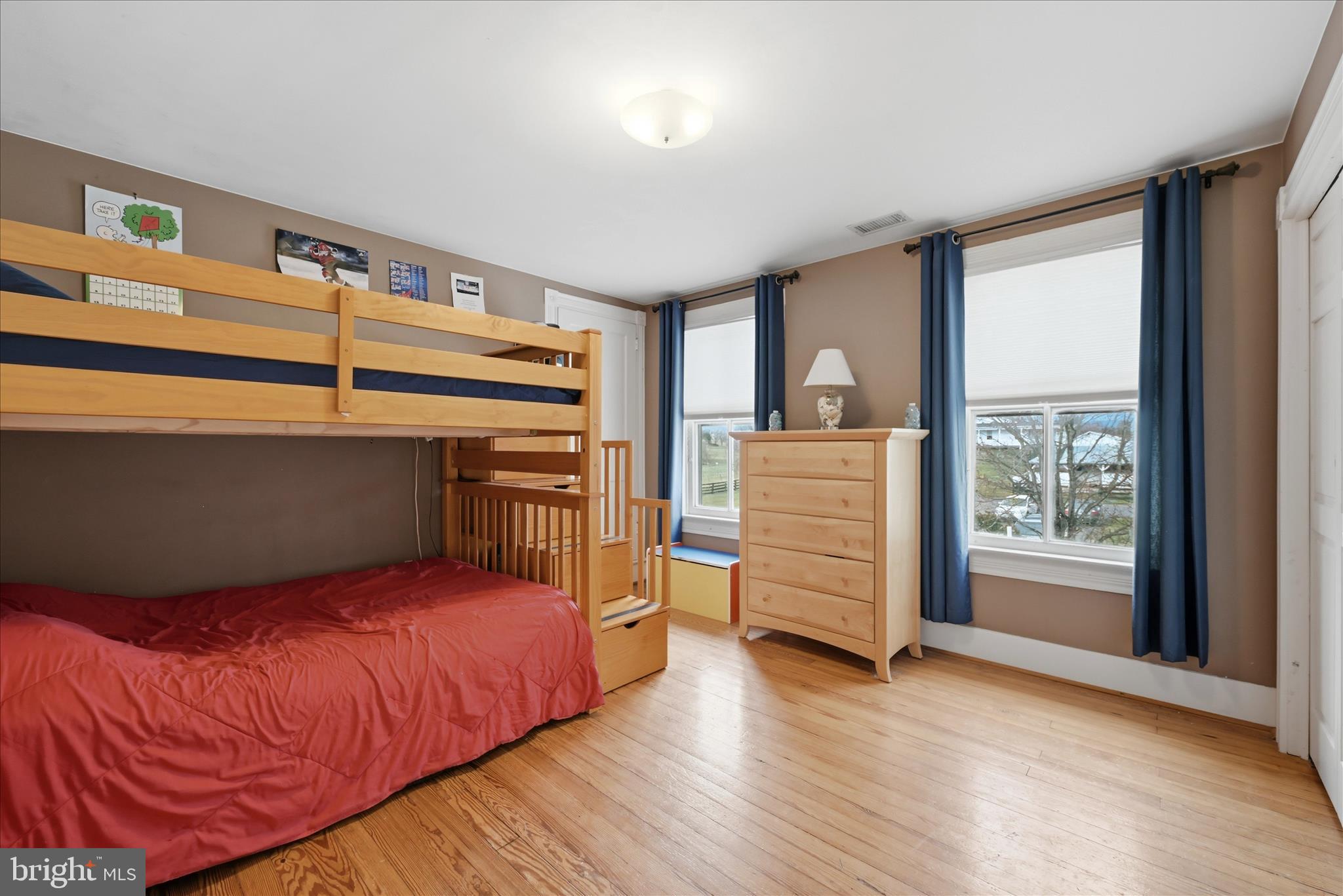 171 Laurel Grove Road Winchester, VA 22602 - Photo 39 of 83 a bedroom with a bed and wooden floor