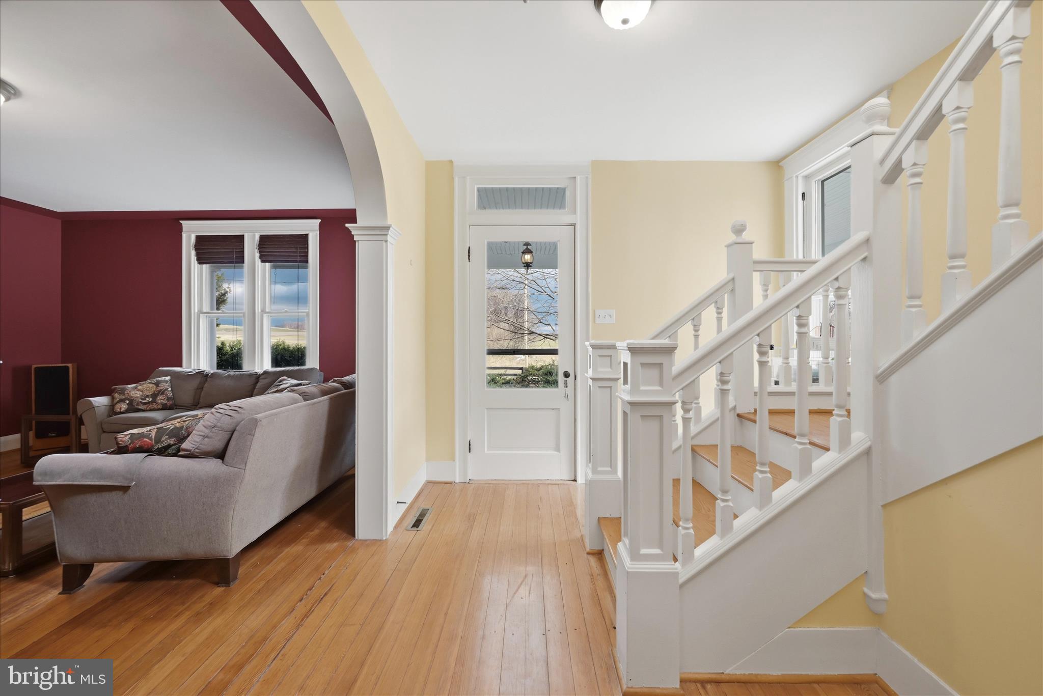 171 Laurel Grove Road Winchester, VA 22602 - Photo 5 of 83 a living room with furniture and a wooden floor