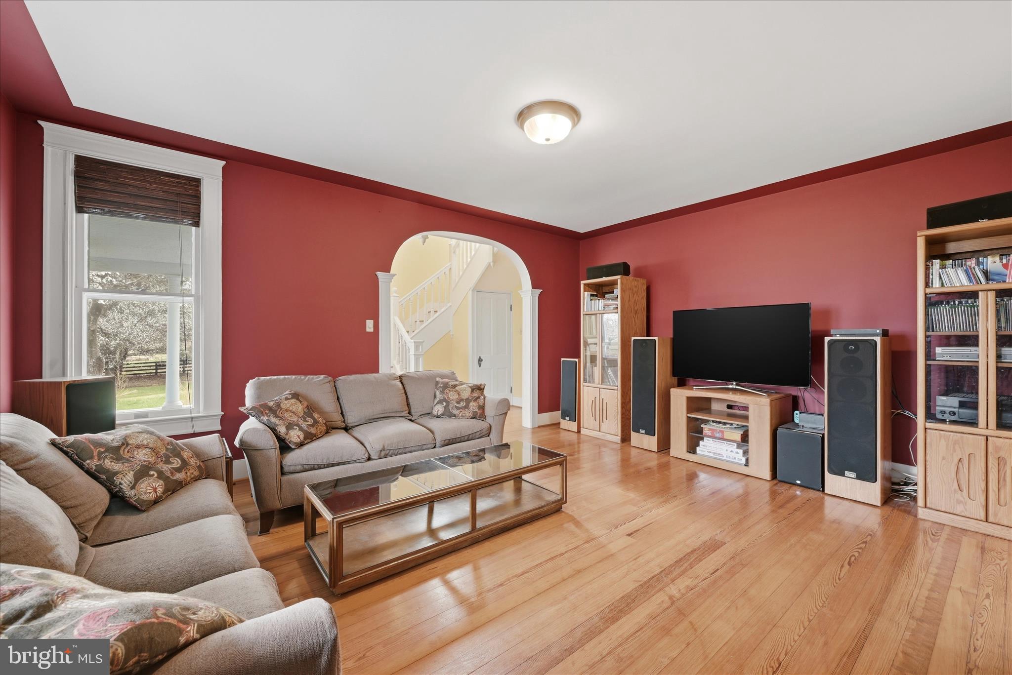 171 Laurel Grove Road Winchester, VA 22602 - Photo 9 of 83 a living room with furniture and a flat screen tv