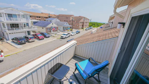 a view of a chairs in a balcony