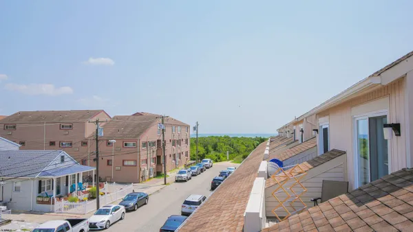 a view of a city with tall buildings