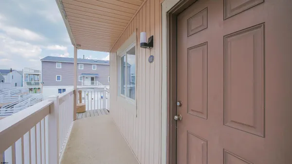 a hallway with cabinets