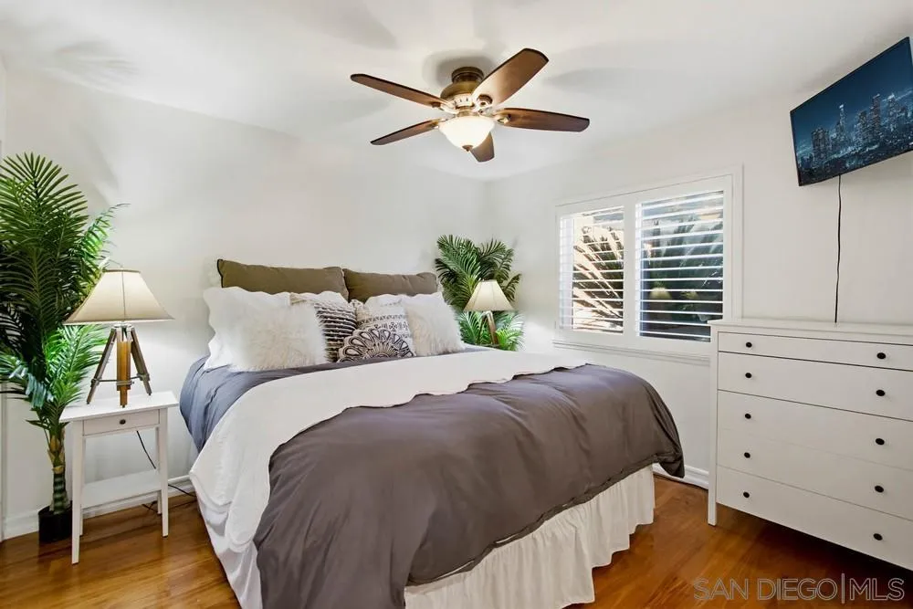 11038 Larkridge Street Santee, CA 92071 - Photo 14 of 44 a bed room with a bed and a window