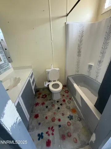 a bathroom with a sink and a toilet