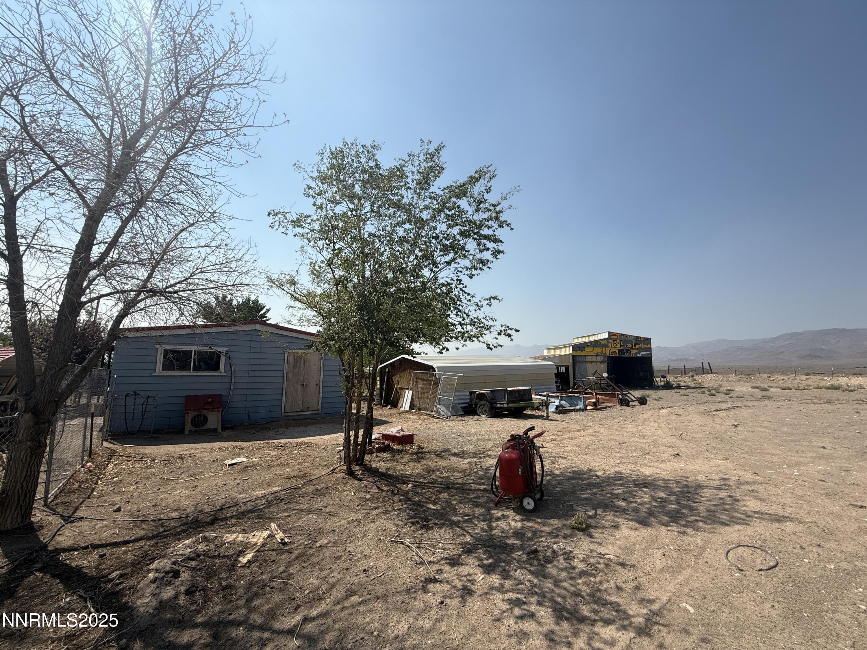 8070 Cheyenne Trail Stagecoach, NV 89429 - Photo 10 of 15 a view of a house with a yard