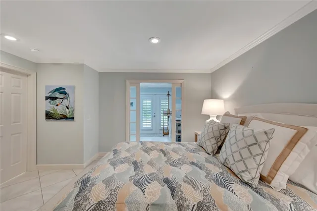 a bed room with a bed and a window