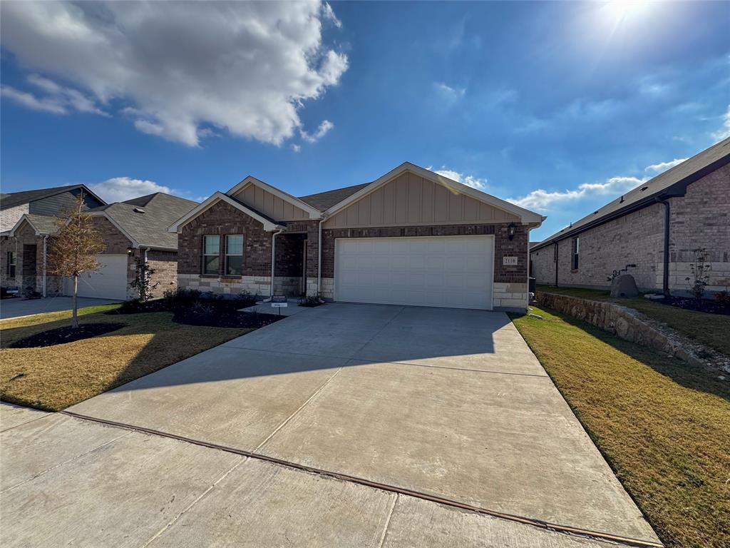 2110 Dunbar Drive Sherman, TX 75092 - Photo 1 of 22 a front view of a house with a yard