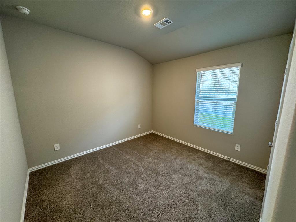 2110 Dunbar Drive Sherman, TX 75092 - Photo 16 of 22 an empty room with a window