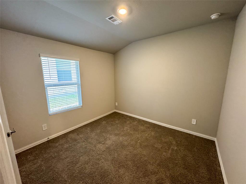 2110 Dunbar Drive Sherman, TX 75092 - Photo 17 of 22 an empty room with a window