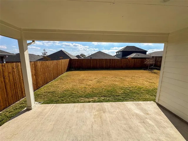 a front view of a house with yard