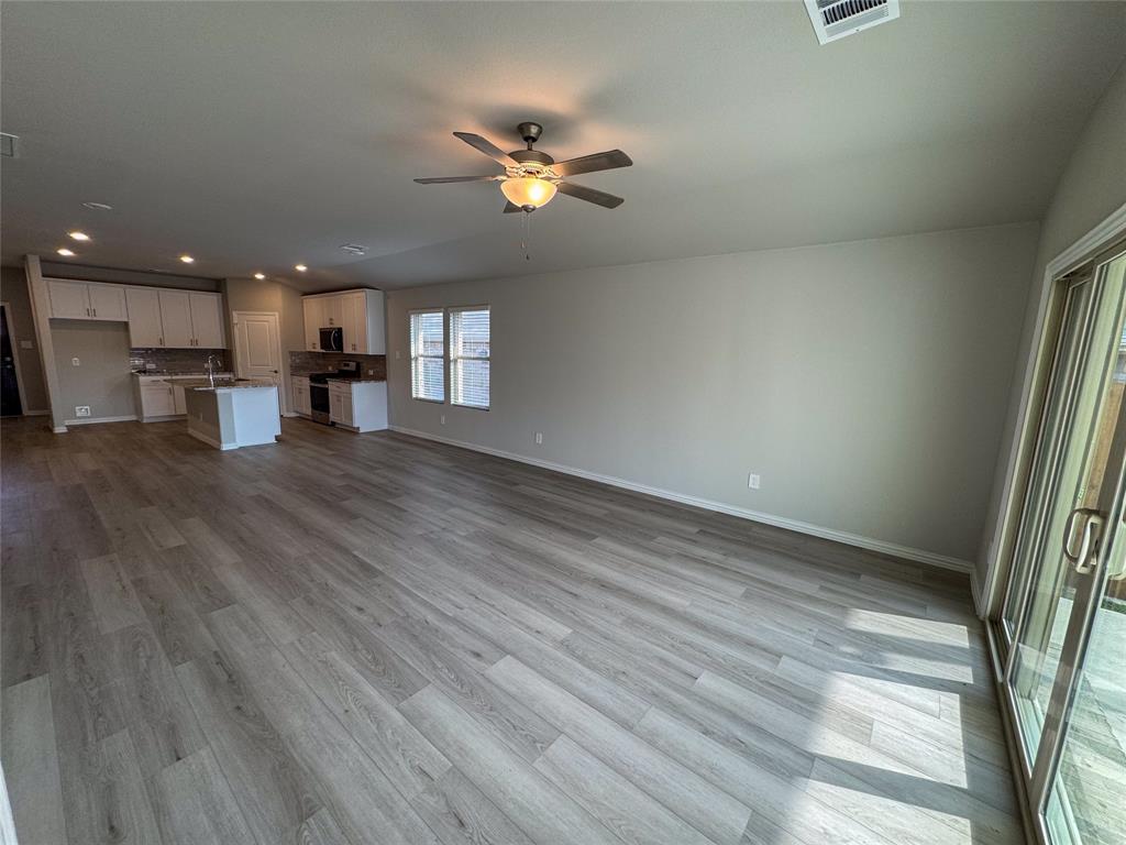 2110 Dunbar Drive Sherman, TX 75092 - Photo 7 of 22 a view of a livingroom with a furniture wooden floor and window