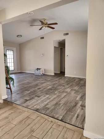 a view of an empty room and window