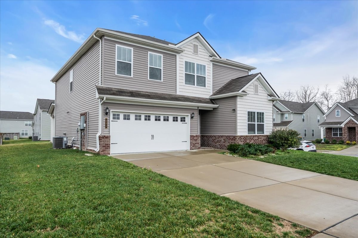 531 Mickelson Way Spring Hill, TN 37174 - Photo 3 of 57 a view of a house with a yard